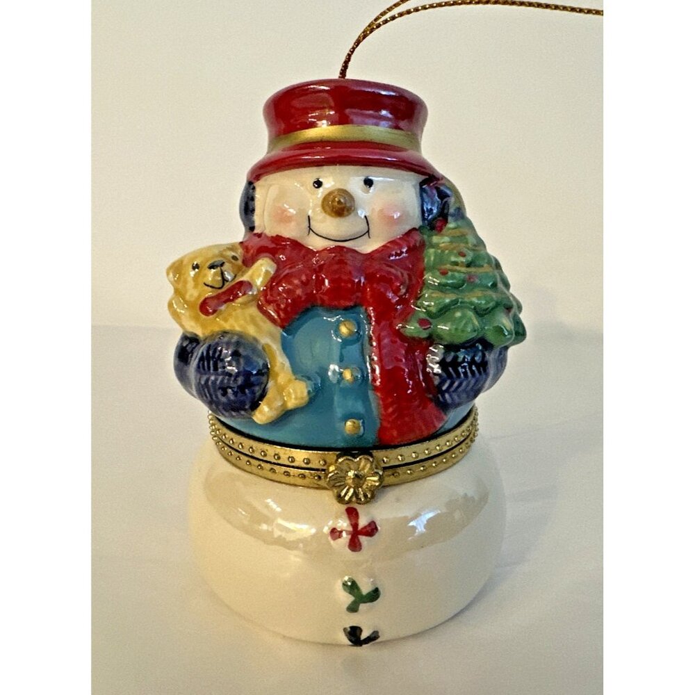 Porcelain Snowman Music Box 3 Ice Skaters Inside "We Wish You A Merry Christmas"